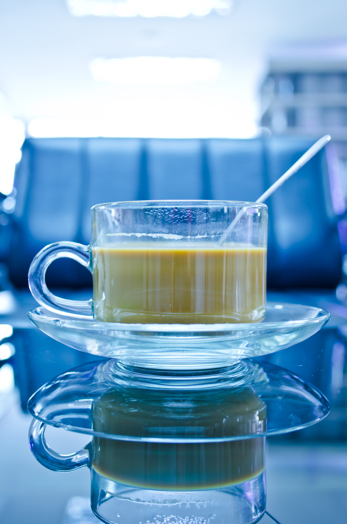 hot coffee in glass cup with plate ISA Distribution